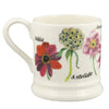 White mug with floral designs and text on a white background
