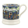 Ceramic mug with a train design on a blue background
