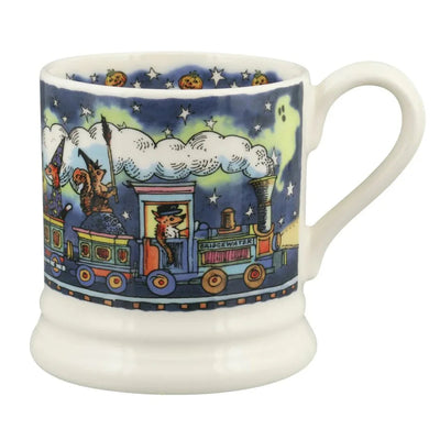 Ceramic mug with a train design on a blue background