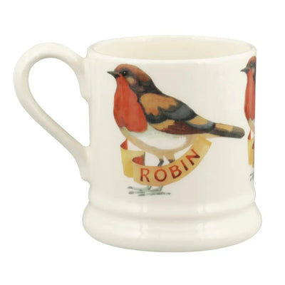 White mug with a robin design on a white background