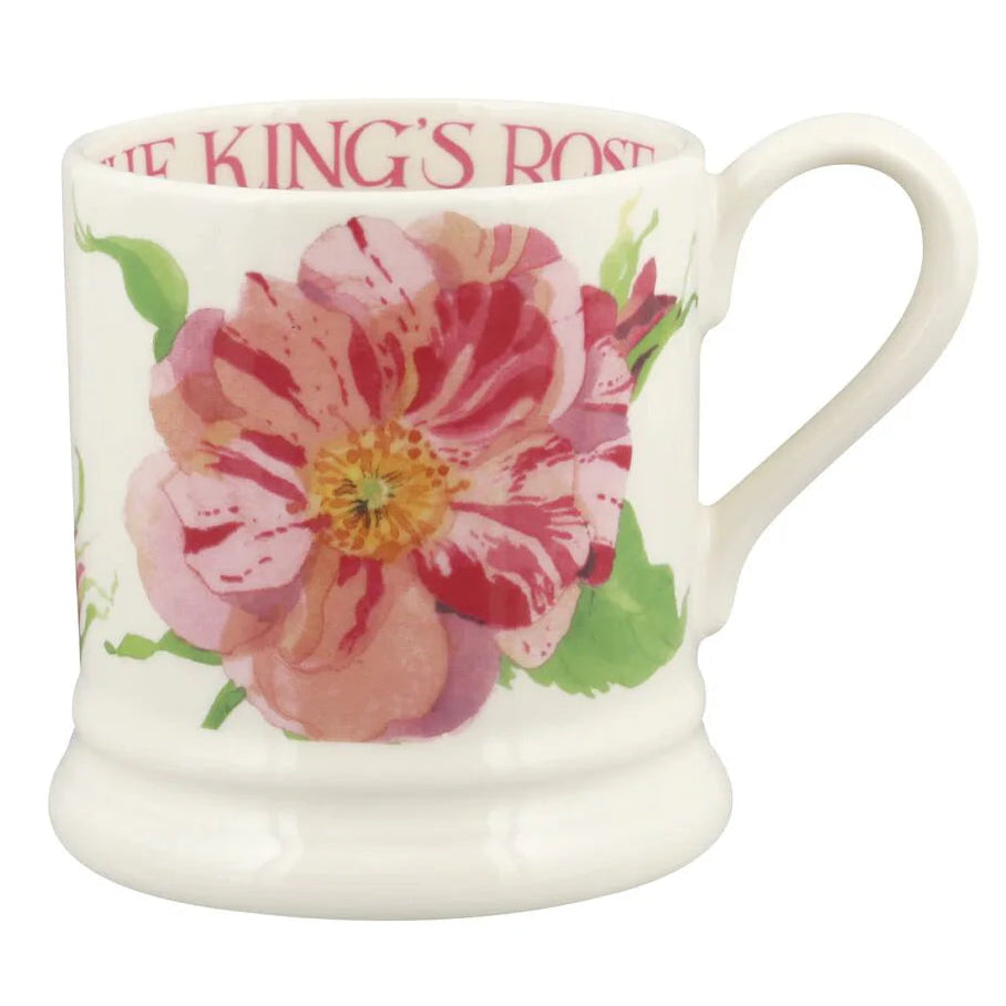 White mug with floral design and 'The King's Rose' text on a white background