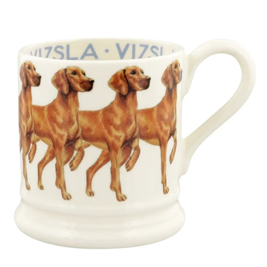 A white ceramic coffee mug featuring a printed illustration of four Vizsla dogs in side profile, with the name 'VIZSLA' printed in blue inside the rim.