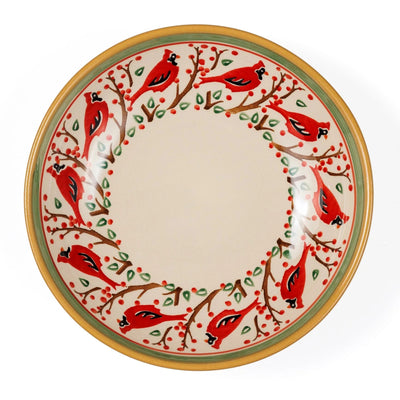 Decorative plate with red bird design on a white background