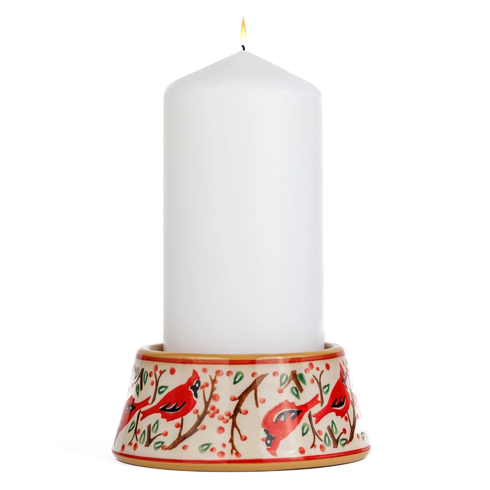 Candle holder with red bird design holding a white candle on a white background