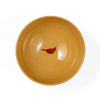 Pottery bowl with a red cardinal design on a white background
